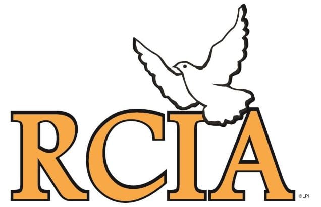 A symbol with RCIA and a dove above the letters