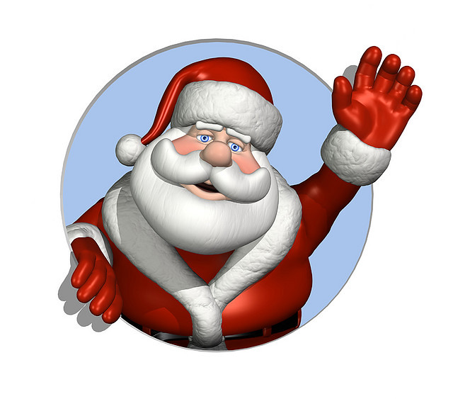 Picture of Santa smiling with his hand raised