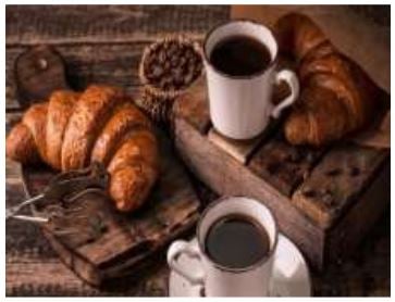 Table setting of pastries and coffee