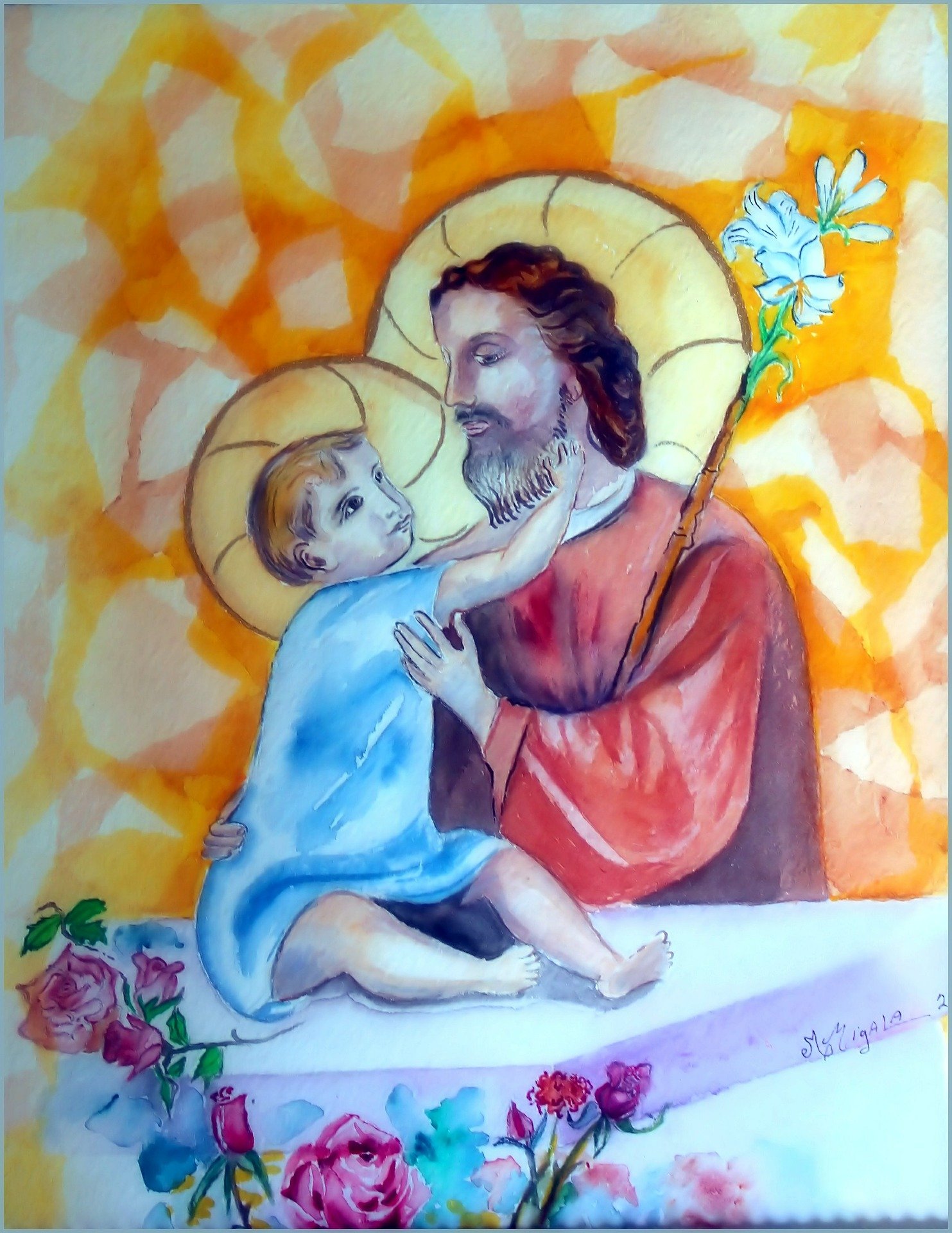 A painting of St. Joseph with Jesus on his lap