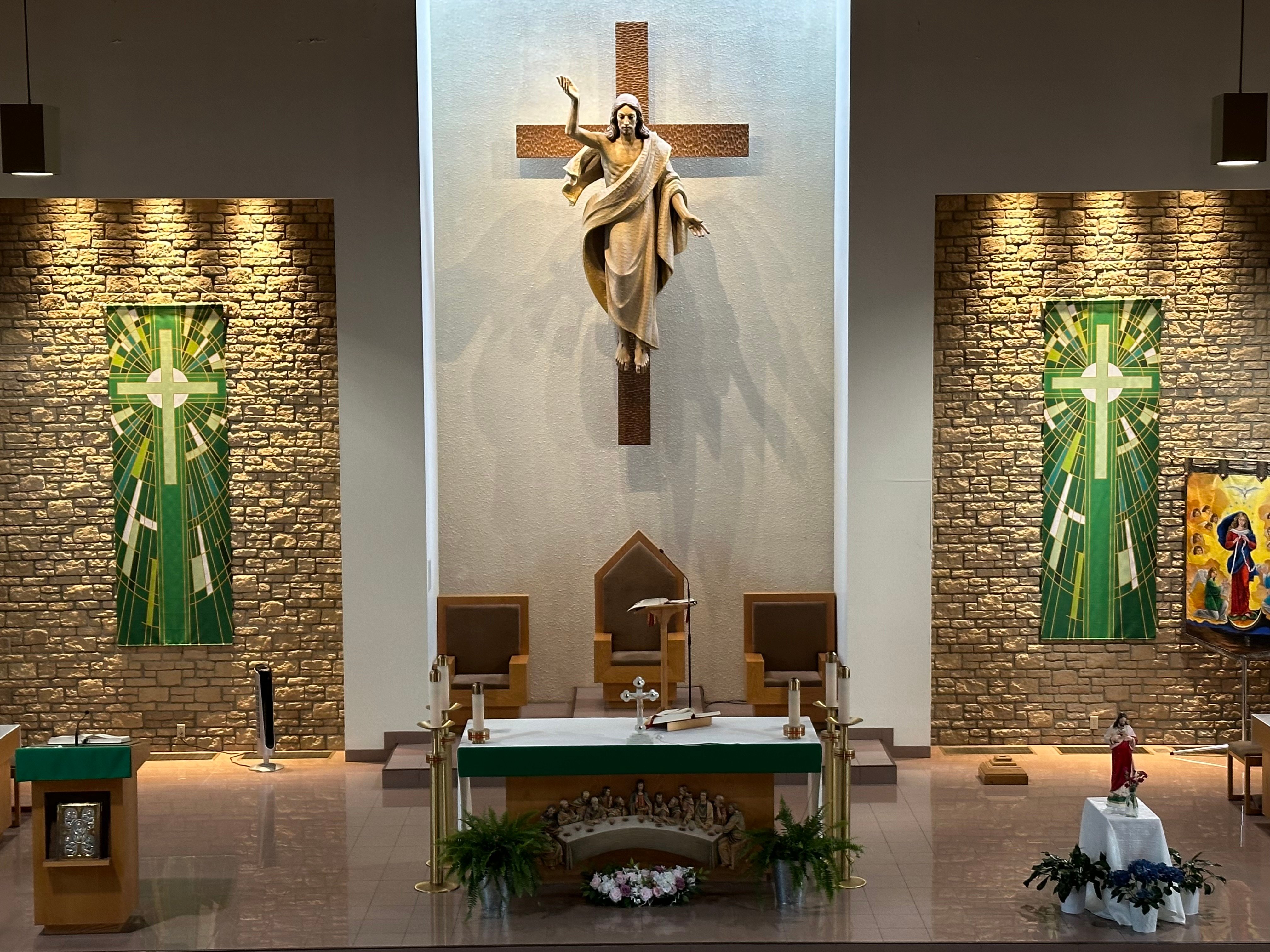 A picture of St. Leonard's Altar with new green banners