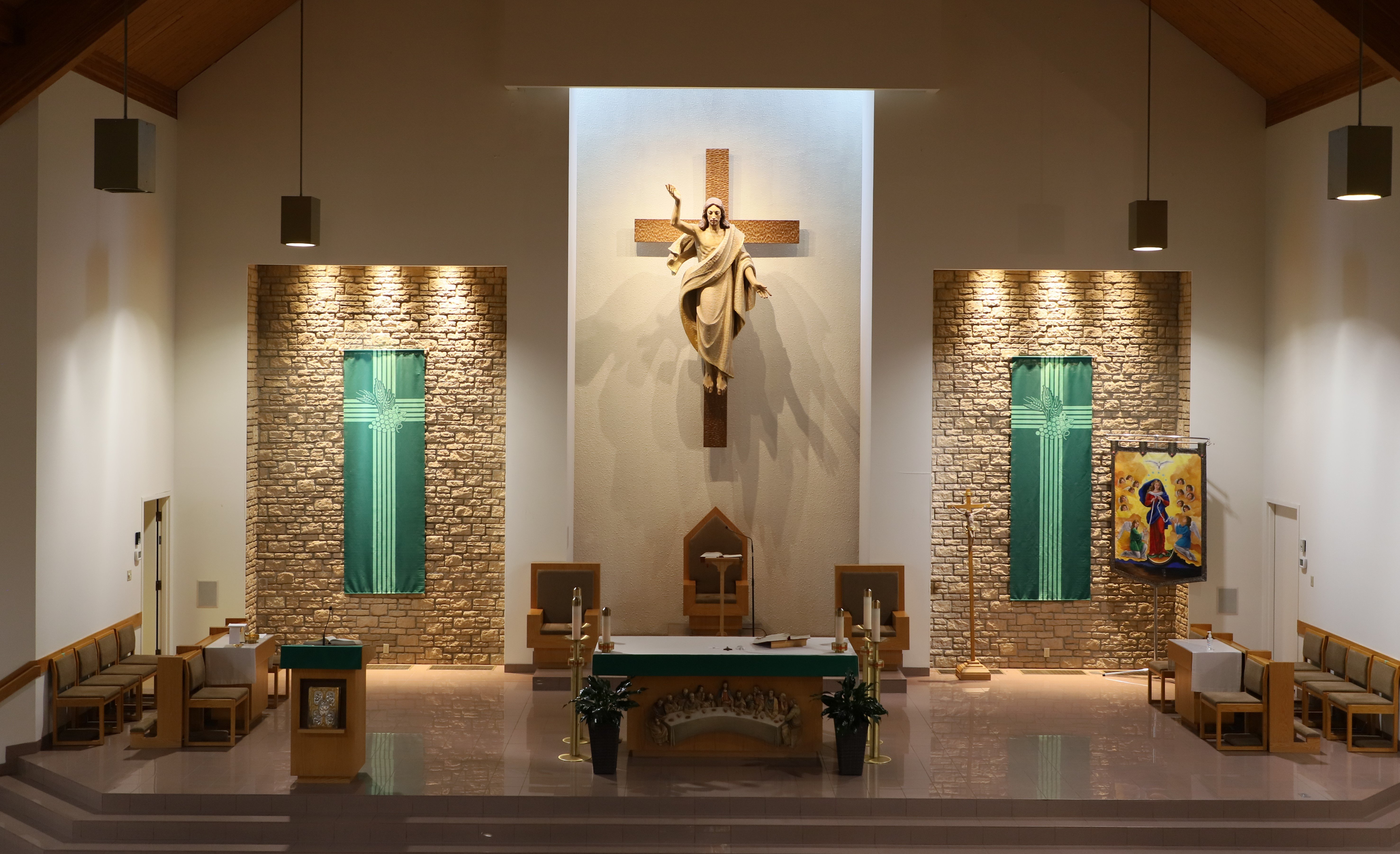 St. Leonard's Altar with green banners on either side of the altar