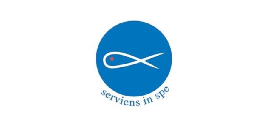 Blue circle with the symbol of the fish and the words "Serviens in spe"